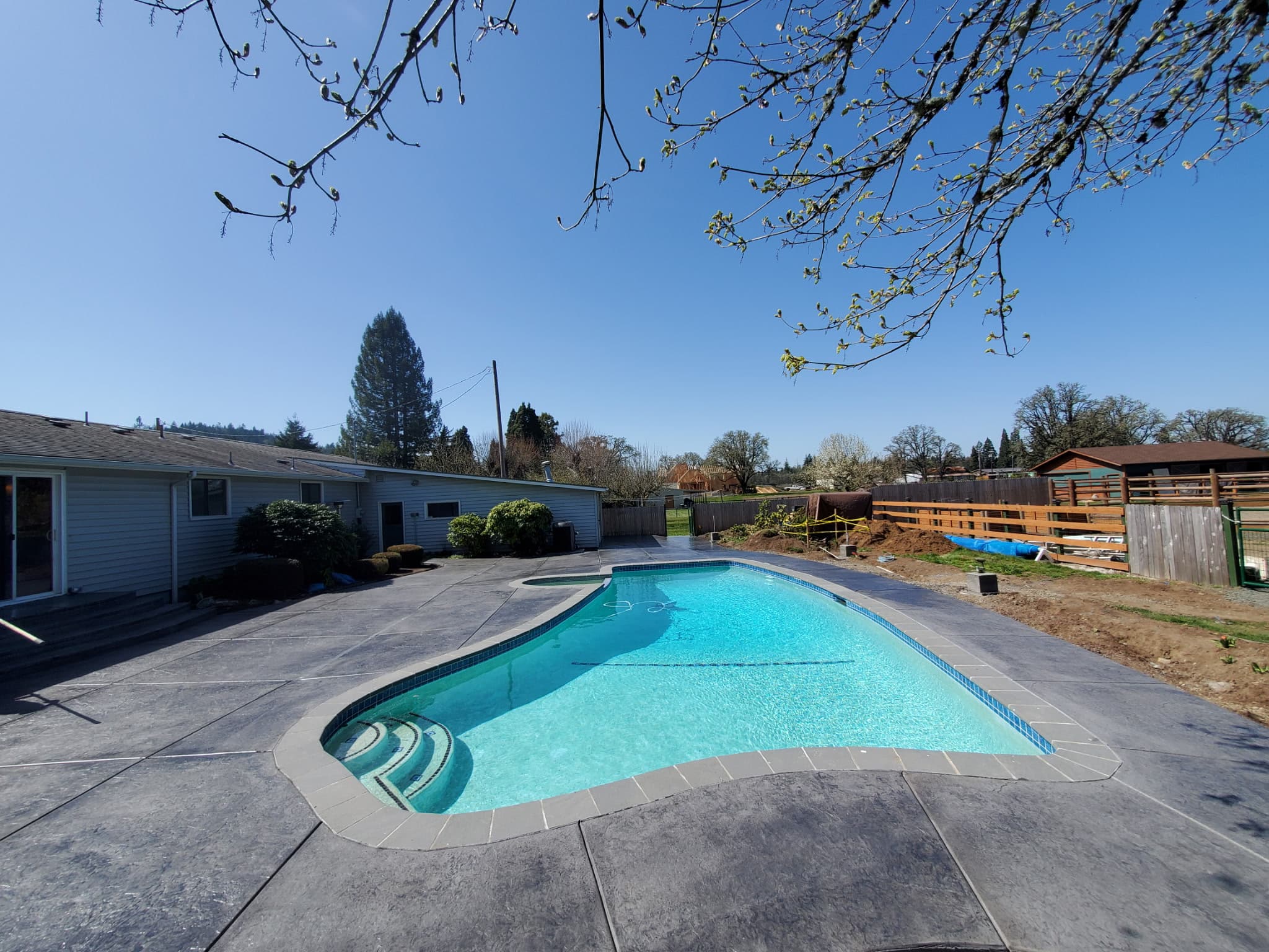 Refinished pool deck with slip-resistant finish