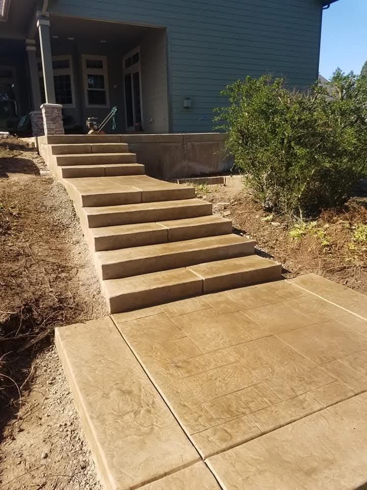 Concrete steps leading up to a patio